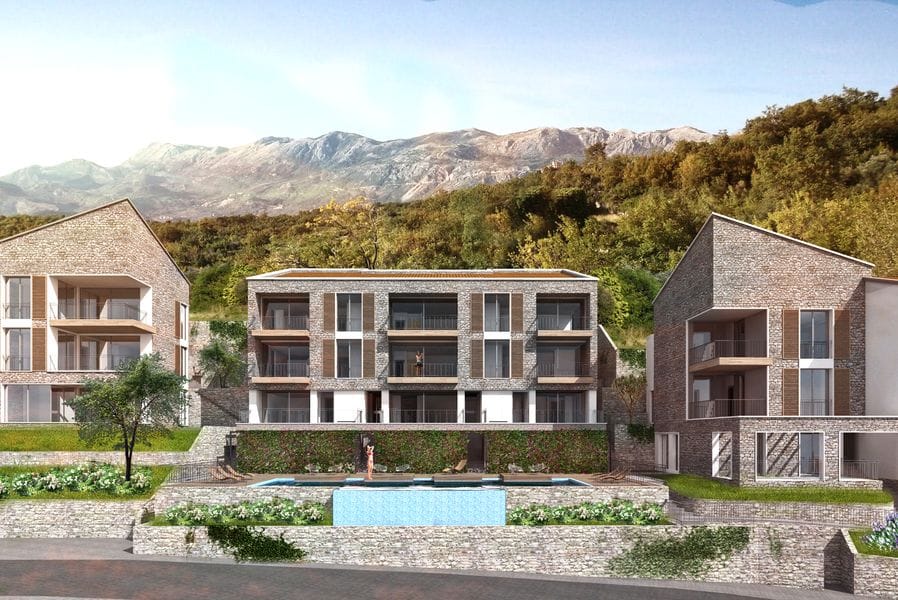 Savremeni stambeni kompleks od kamena sa bazenom i pogledom na planine u Reževićima, Crna Gora. Projekat luksuzne nekretnine.