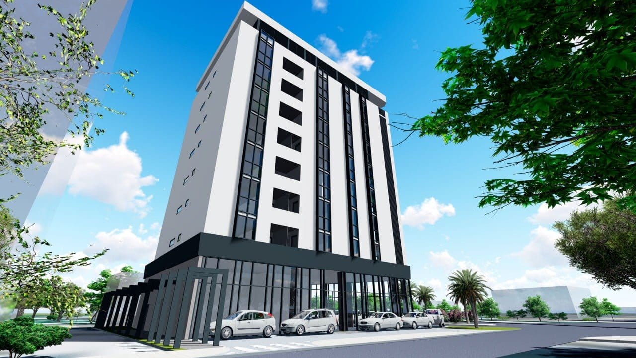 Moderner mehrstöckiger Wohnkomplex mit Panoramafenstern in der Stadt Bar, Montenegro: Ansicht der Fassade und des Parkplatzes.