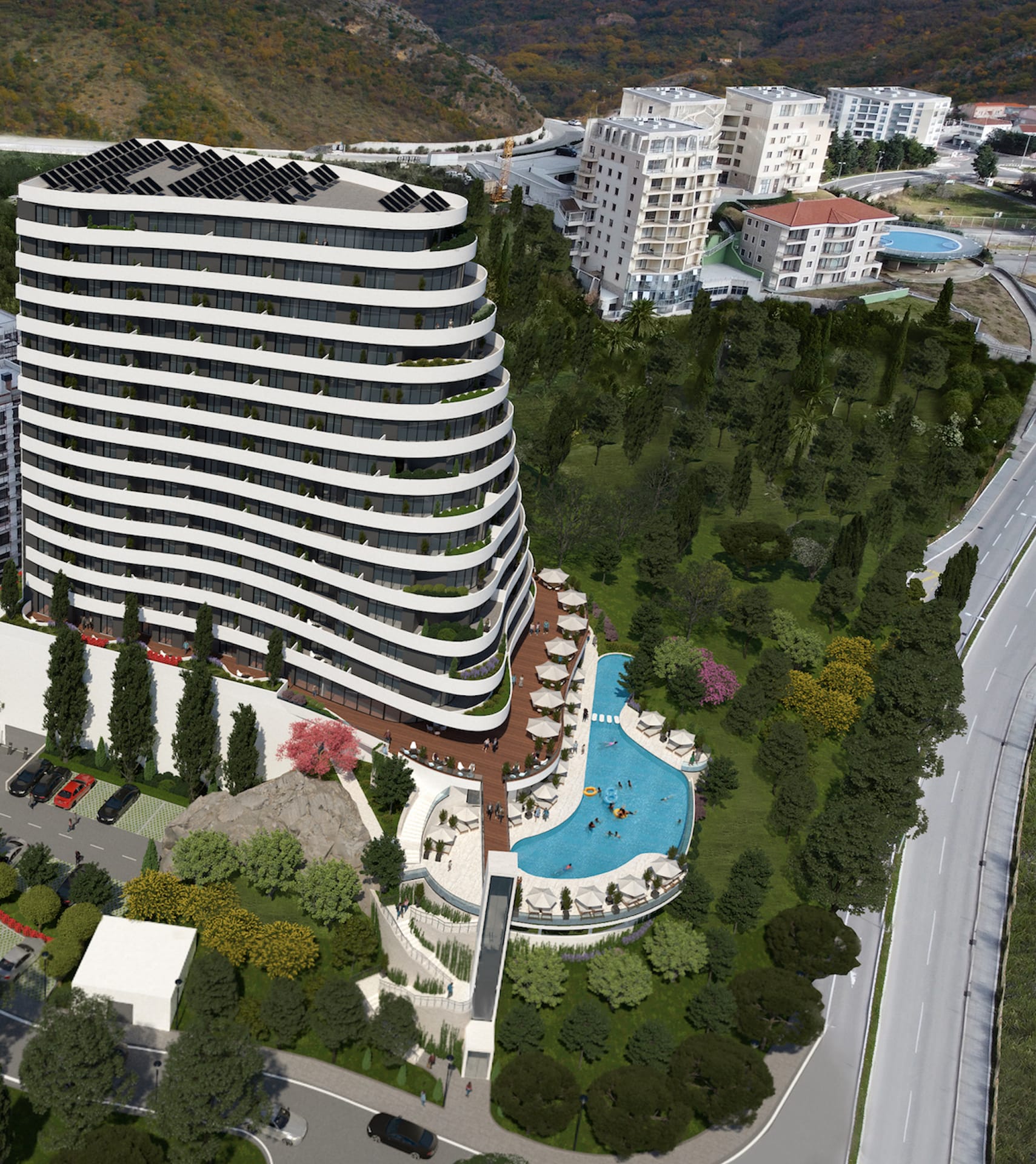 Nowoczesny kompleks mieszkaniowy w Bečići, Czarnogóra: panoramiczny widok na budynek z basenem, tarasem i parkingiem.