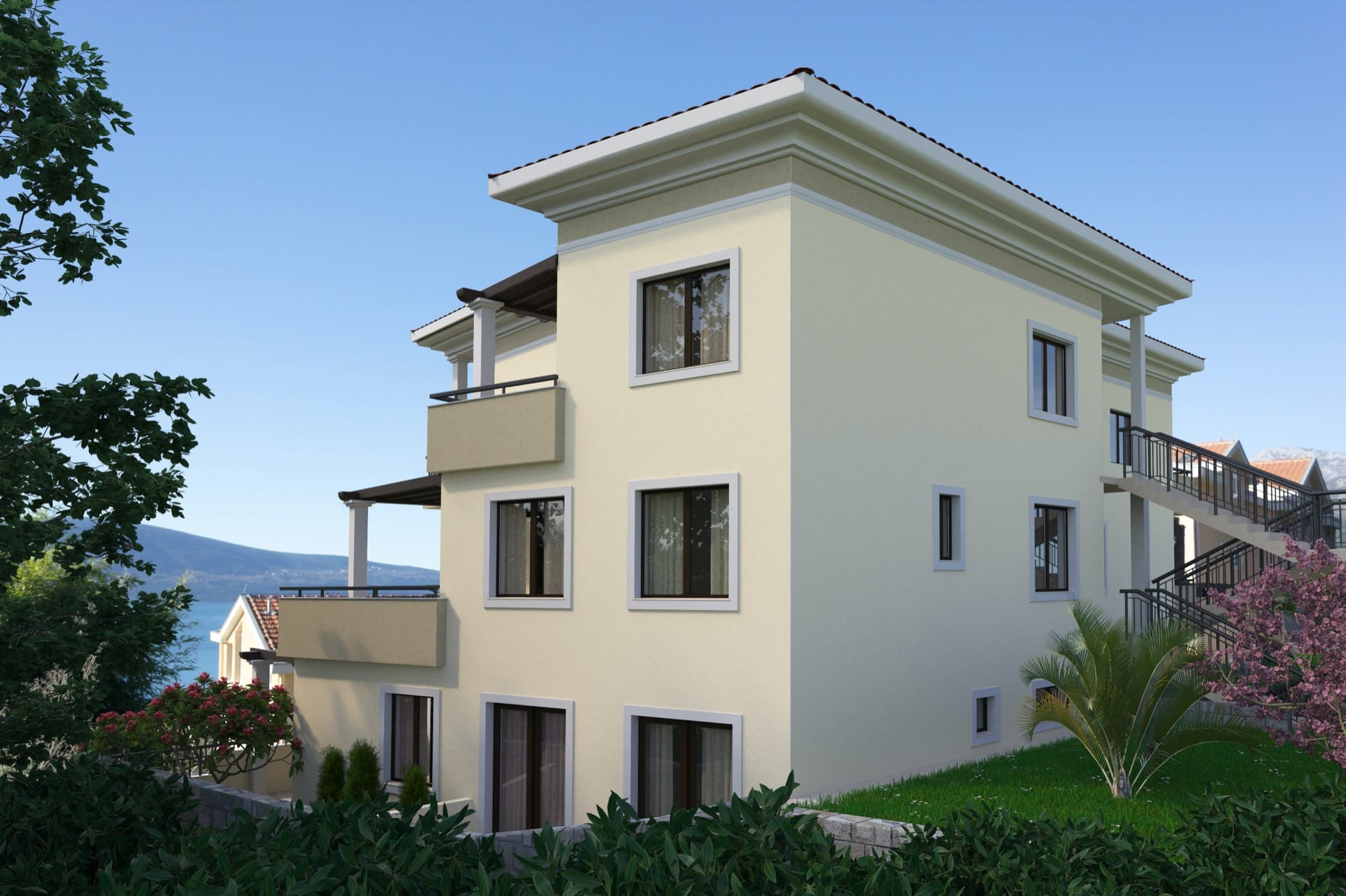 Three-story residential house with balconies and sea view in Tivat, Montenegro: modern architecture and landscaping.