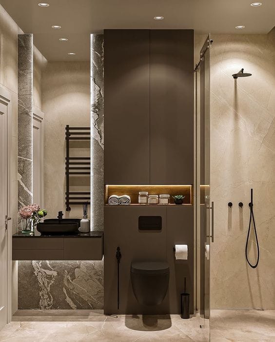 Modern bathroom in Budva residential complex, Montenegro: black fixtures, marble finishes, and built-in lighting.