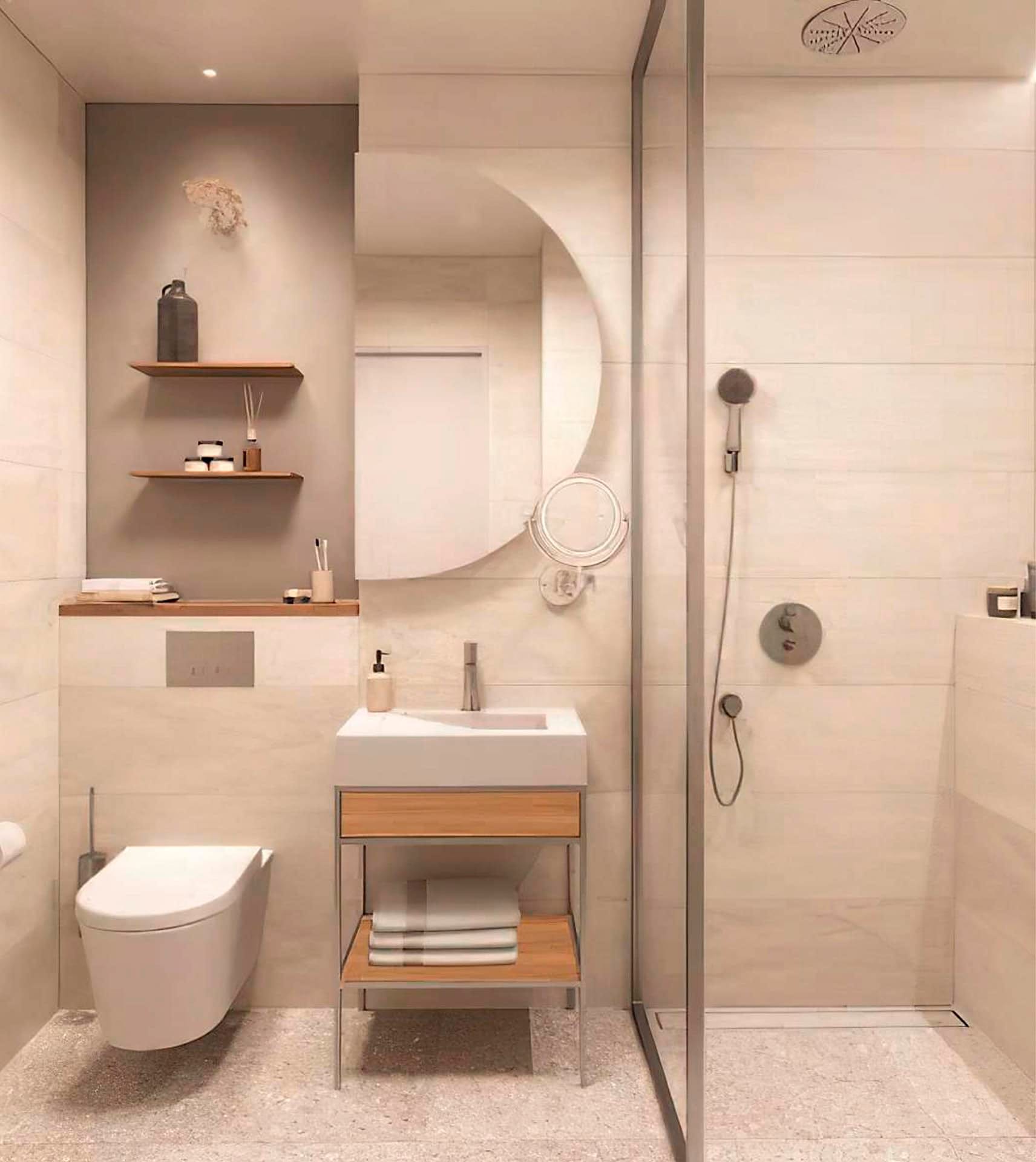 Современная ванная комната в отеле Boka Place, Тиват, Черногория: душевая кабина, стильная мебель и декор.