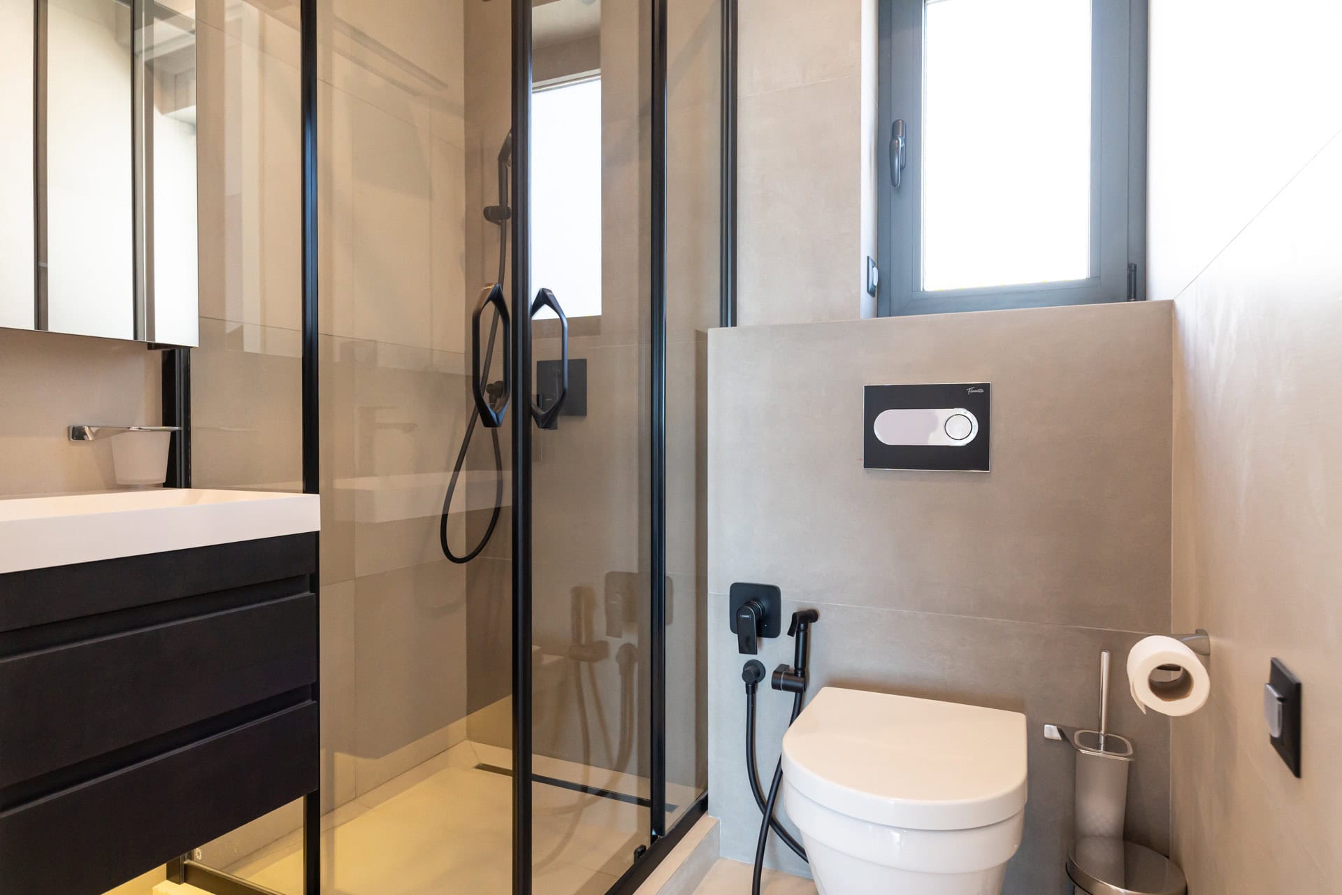 Modern bathroom with a shower cabin and plumbing fixtures in a villa, Kavac, Montenegro: stylish interior and finishes.