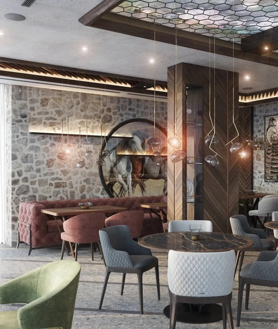 Enterijer restorana vile u Petrovcu, Crna Gora: kameni zidovi, dizajnerski nameštaj i stilizovano osvetljenje.