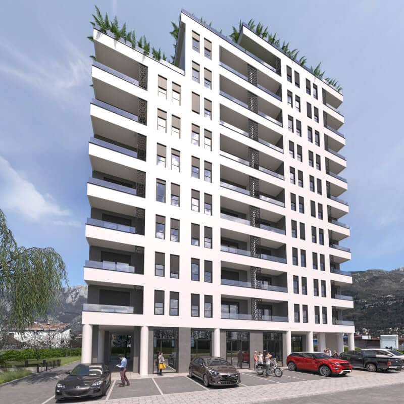 Moderner Wohnkomplex mit Terrassen und Parkplätzen in der Stadt Bar, Montenegro. Fassade eines neuen Hauses mit Begrünung.