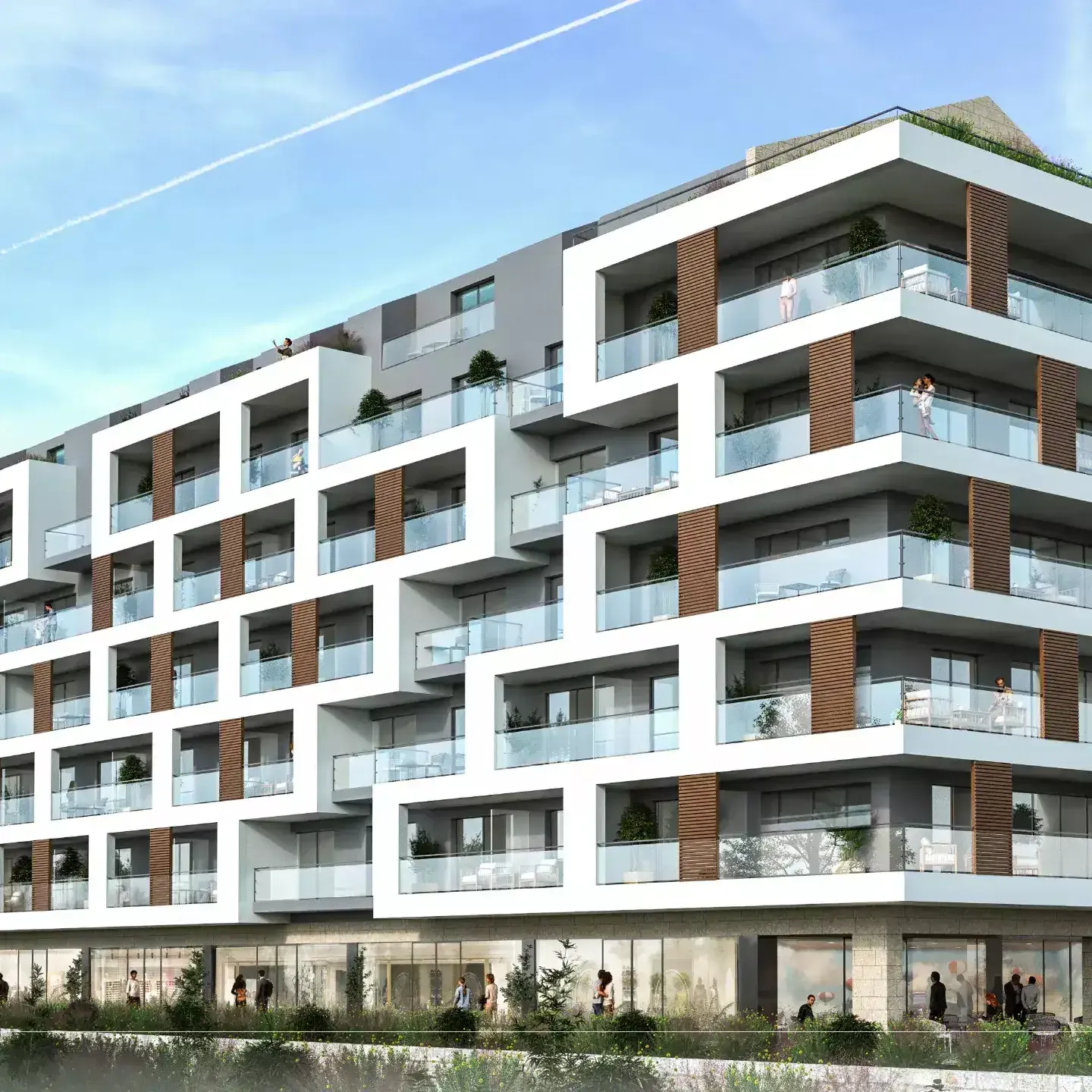 Modern multi-story residential building with terraces and ground floor shops