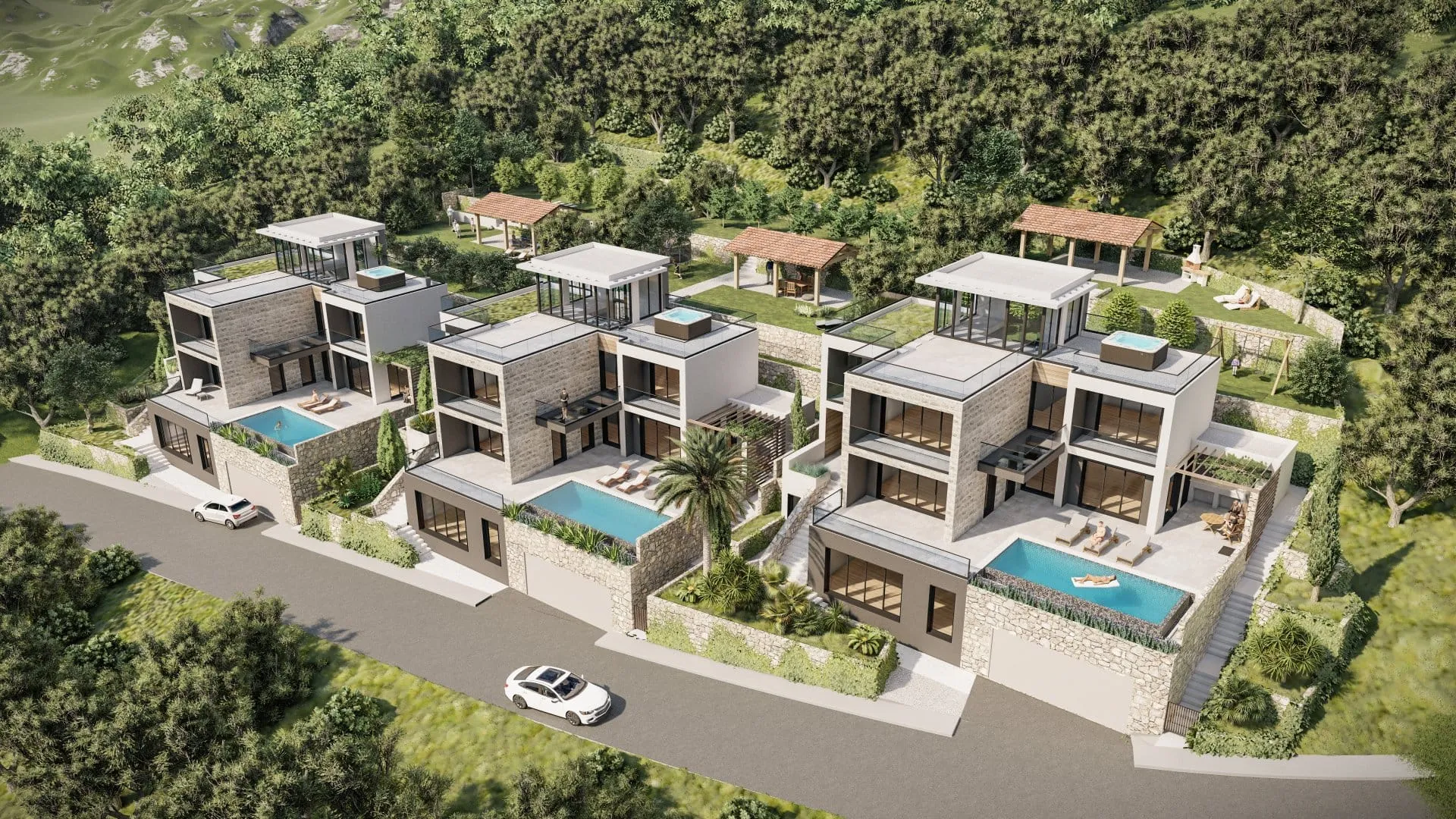 Exterior view of modern luxury villas with pools on a hillside