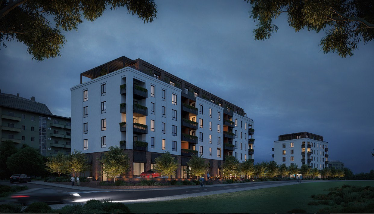 Moderner Wohnkomplex LUMEN HOMES in Podgorica, Montenegro: Nachtansicht der beleuchteten Fassade mit Balkonen.