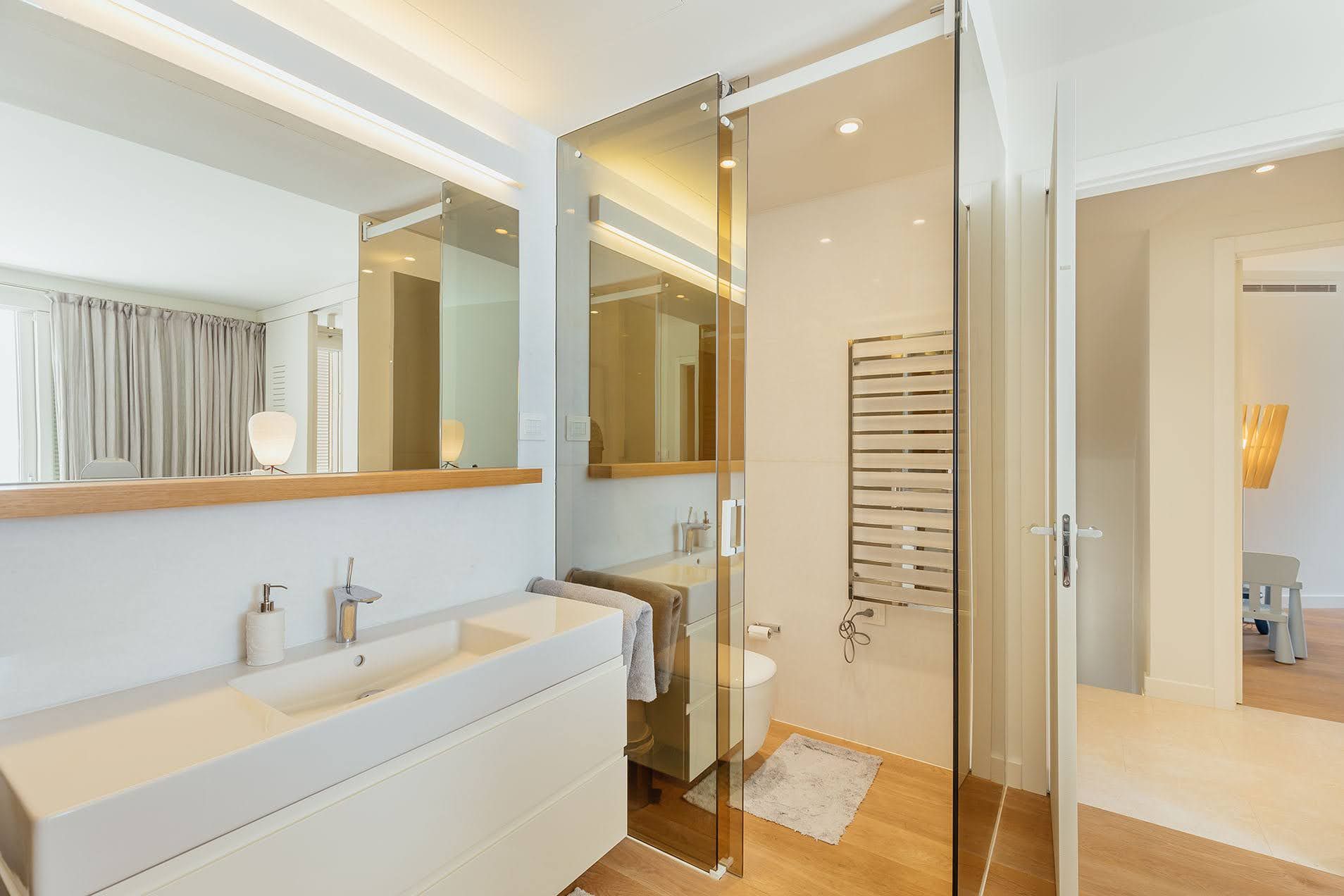 Modern bathroom with a shower cabin and stylish finishes in a villa in Pržno, Montenegro.