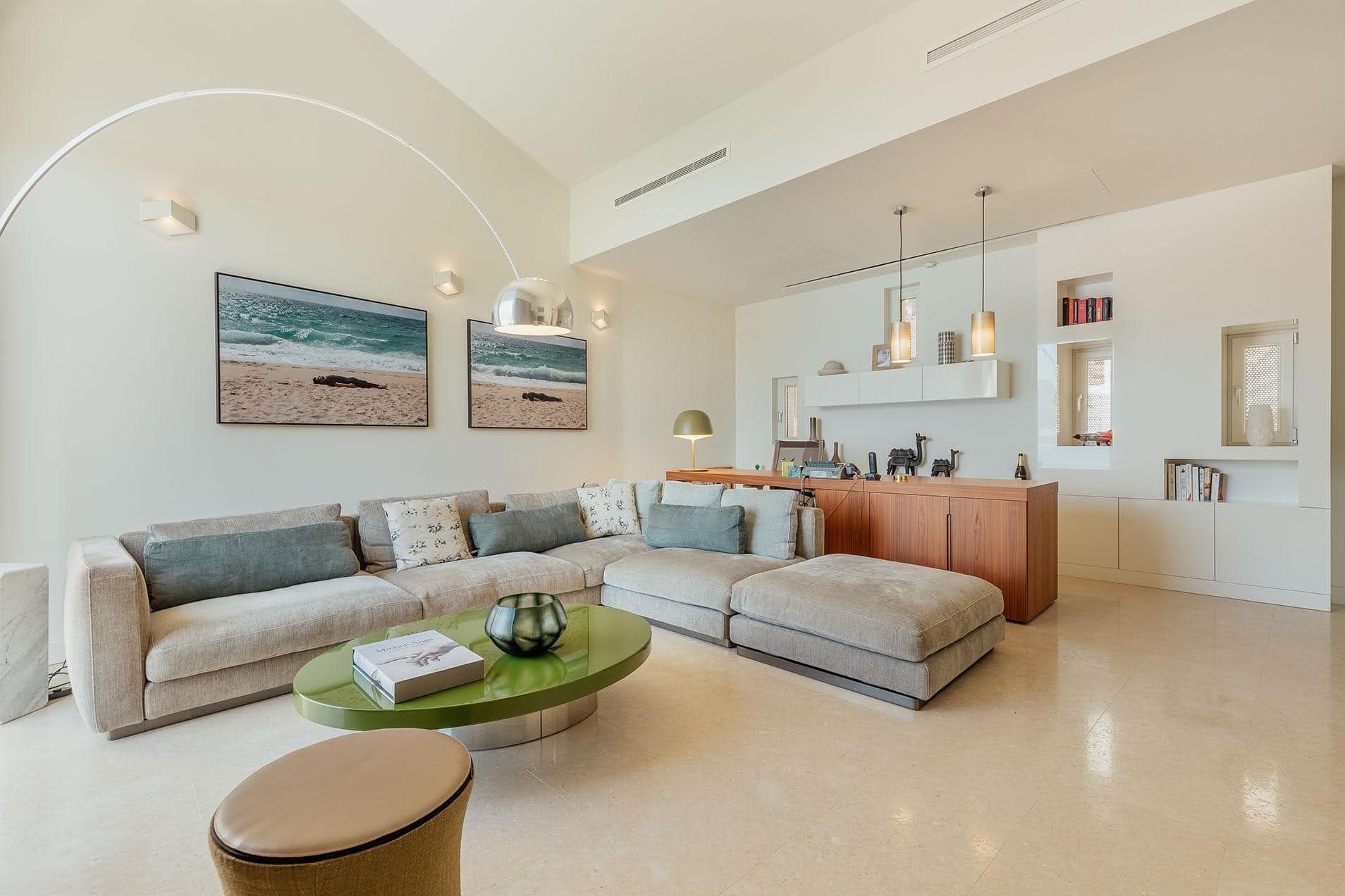 Modern living room with a soft sofa and designer table in a villa in Pržno, Montenegro, bright interior.