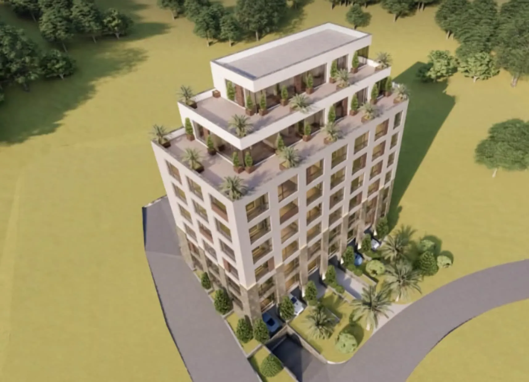 Draufsicht auf ein modernes Gebäude mit Terrassen und Bäumen.