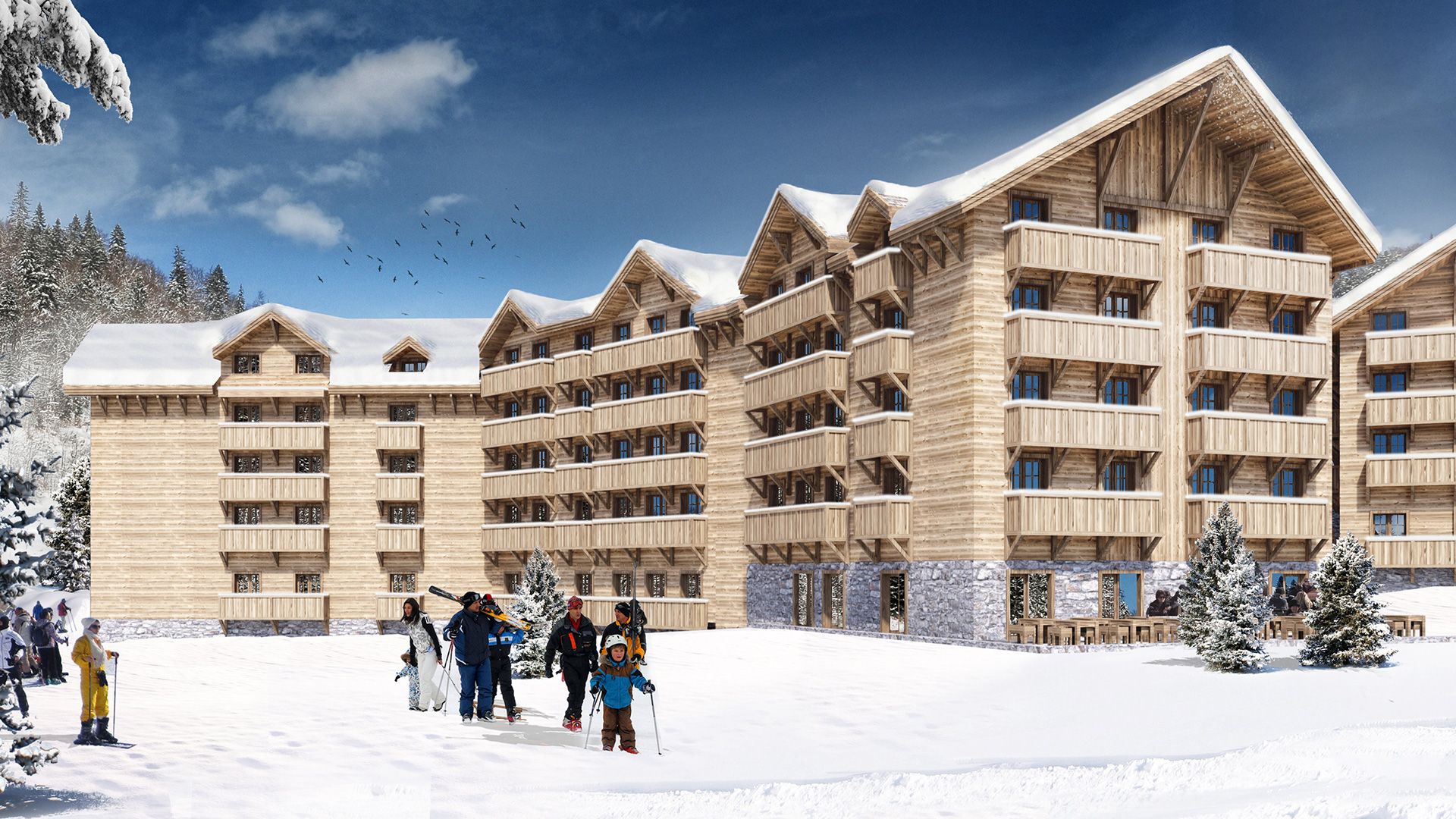 Façade de l’hôtel en bois K1600 à Kolasin enneigée, Monténégro, avec des skieurs en arrière-plan dans une station de montagne.