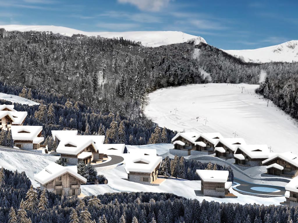 Chalet and hotel in the mountains of Kolašin, Montenegro: view of the snow-covered ski resort and coniferous forest in Bjelasica.