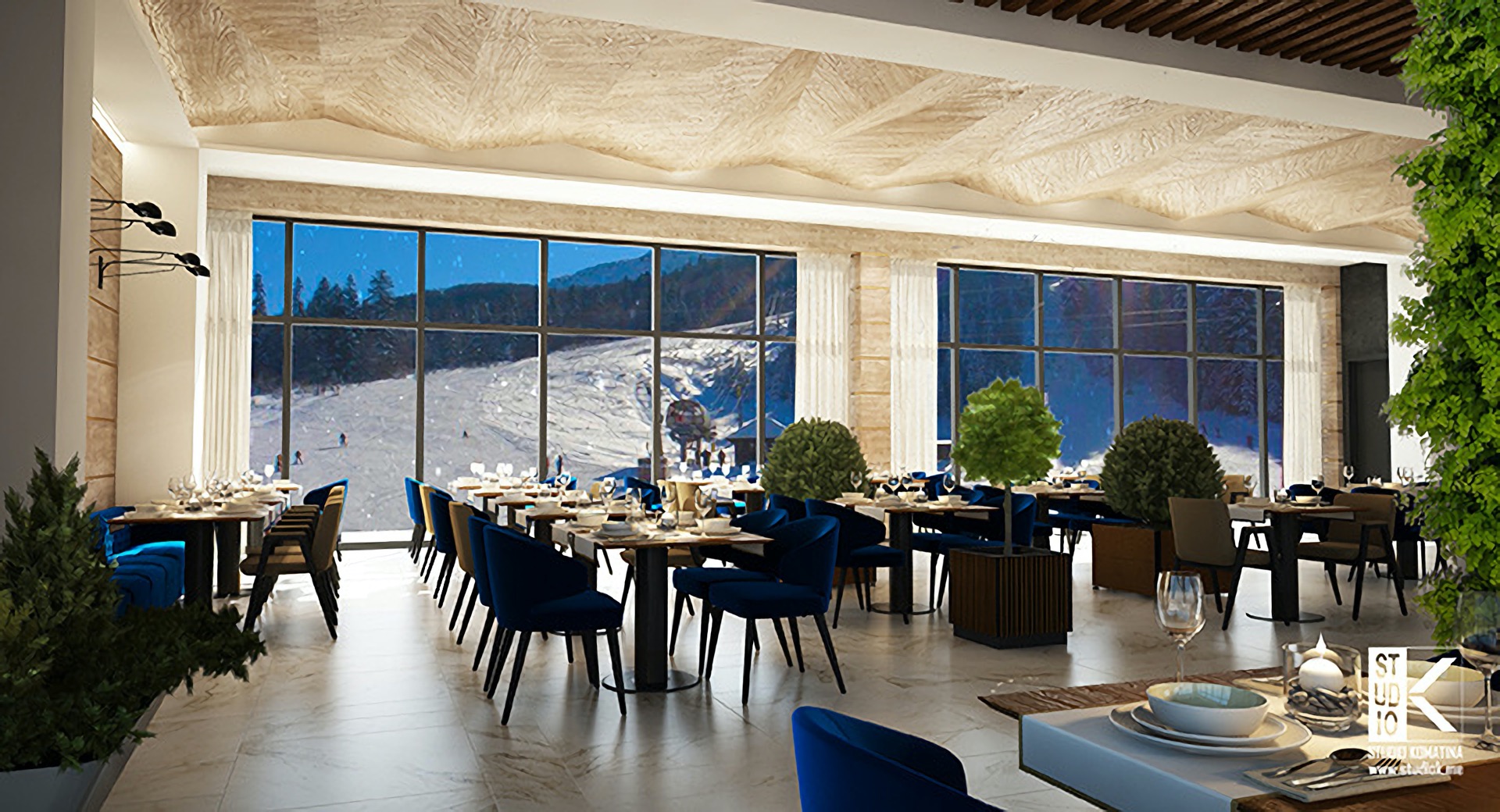 Интерьер ресторана отеля The Westin в Колашине, Черногория, с панорамным видом на горнолыжный склон и синими креслами.