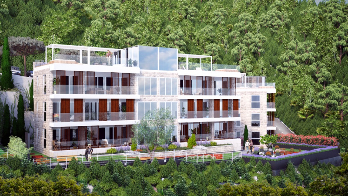 Moderner Wohnkomplex in Budva, Montenegro: Fassade mit Panoramafenstern, Terrassen und Blick auf den Wald.