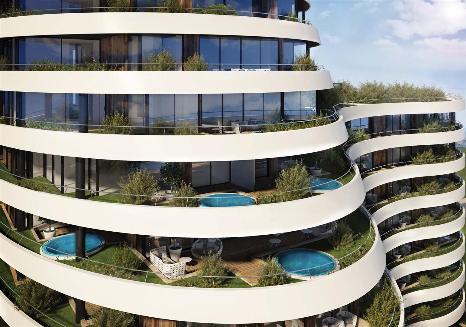 Moderner Wohnkomplex in Budva, Montenegro: Terrassen mit privaten Pools, Begrünung und Ruhebereich.