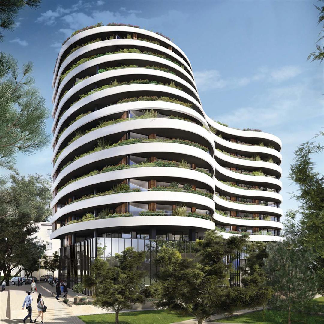 Moderner Wohnkomplex mit geschwungenen Terrassen und Begrünung in Budva, Montenegro — exklusive Immobilie von außen.