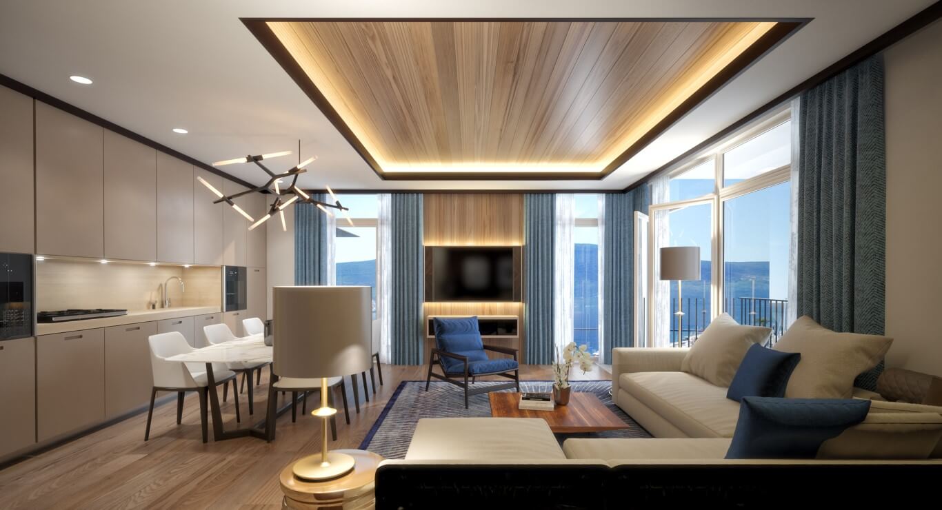 Modern living room with kitchen in an apartment in Tivat, Montenegro: panoramic windows with sea view, stylish interior.