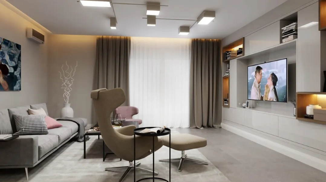 Modernes Wohnzimmer im Wohnkomplex Rafailovići, Bečići, Montenegro: stilvolle Möbel, TV-Bereich und gemütliches Interieur in Grautönen.