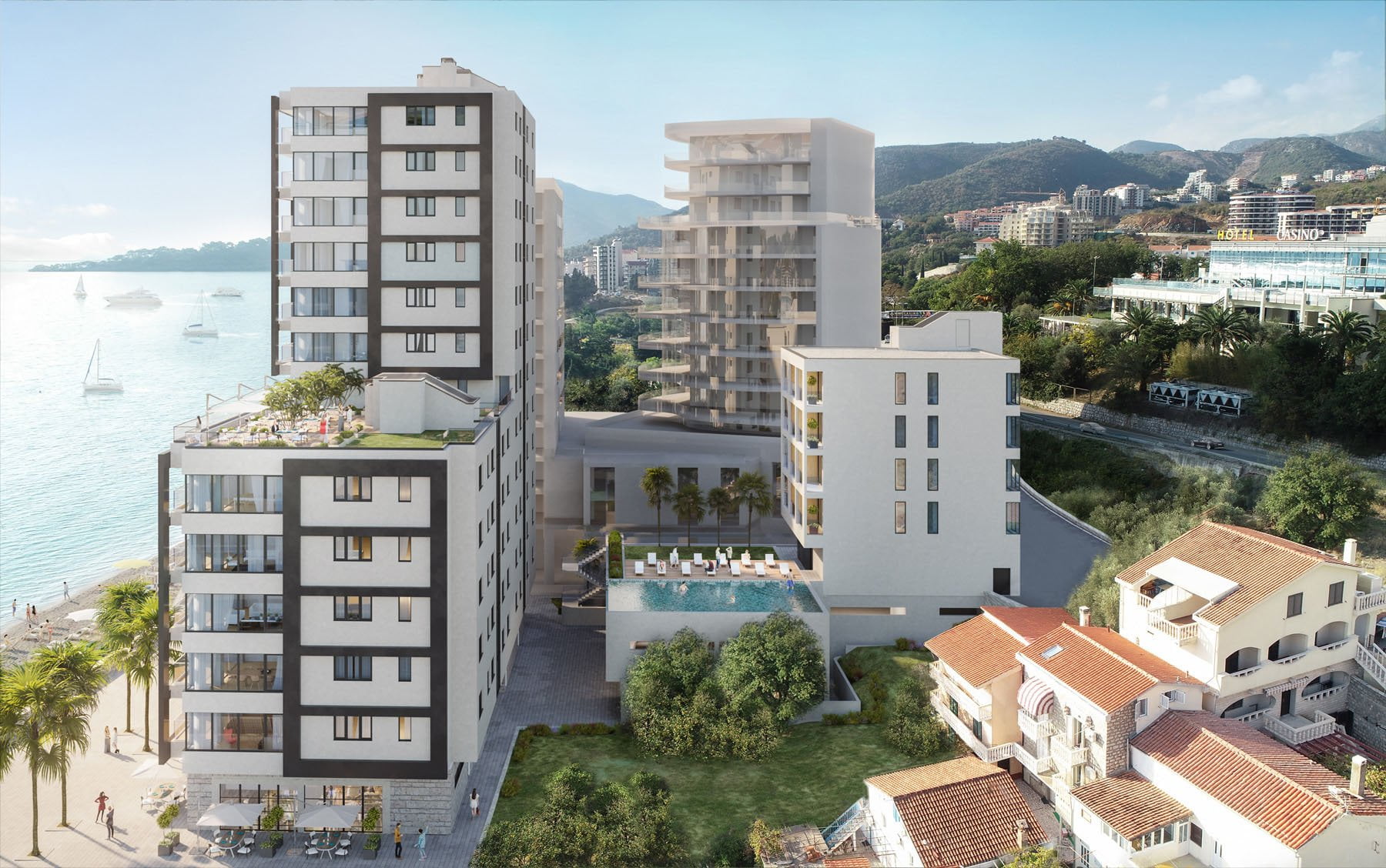 Karadağ, Rafailovići’de modern konut kompleksi: havuz, teraslar ve deniz ile dağların panoramik manzarası.