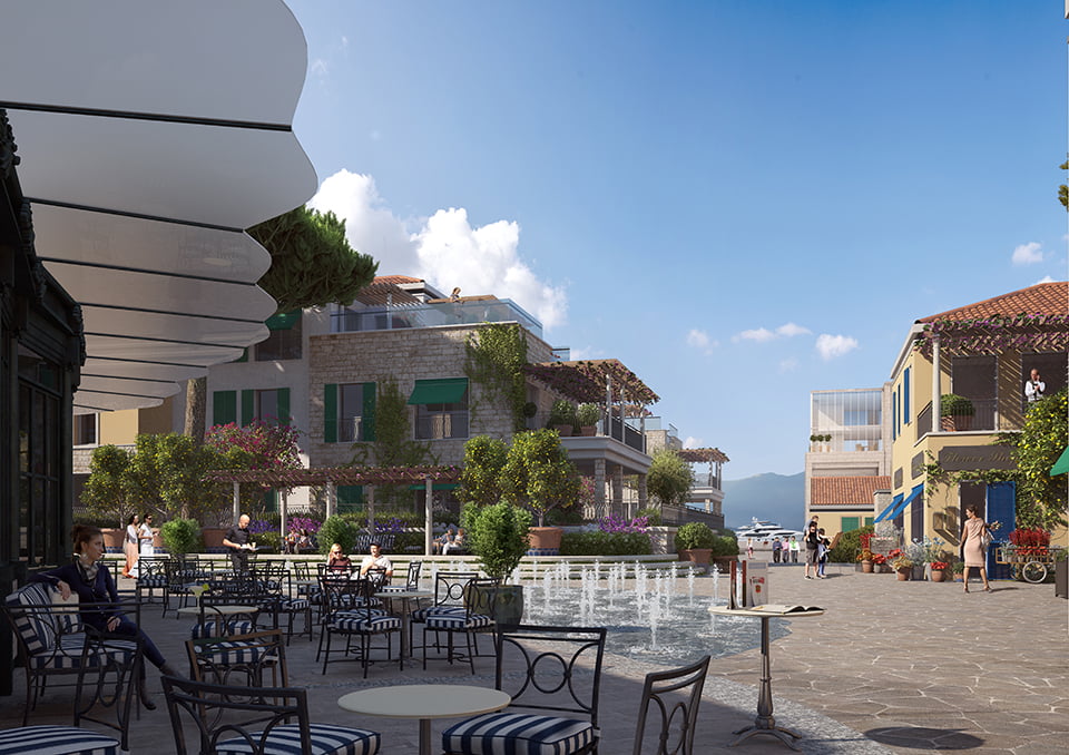 Çeşmeli kafe yaz terasına ve taş villalara sahip Porto Novi lüks kompleksinin görünümü, Kumbor, Karadağ.