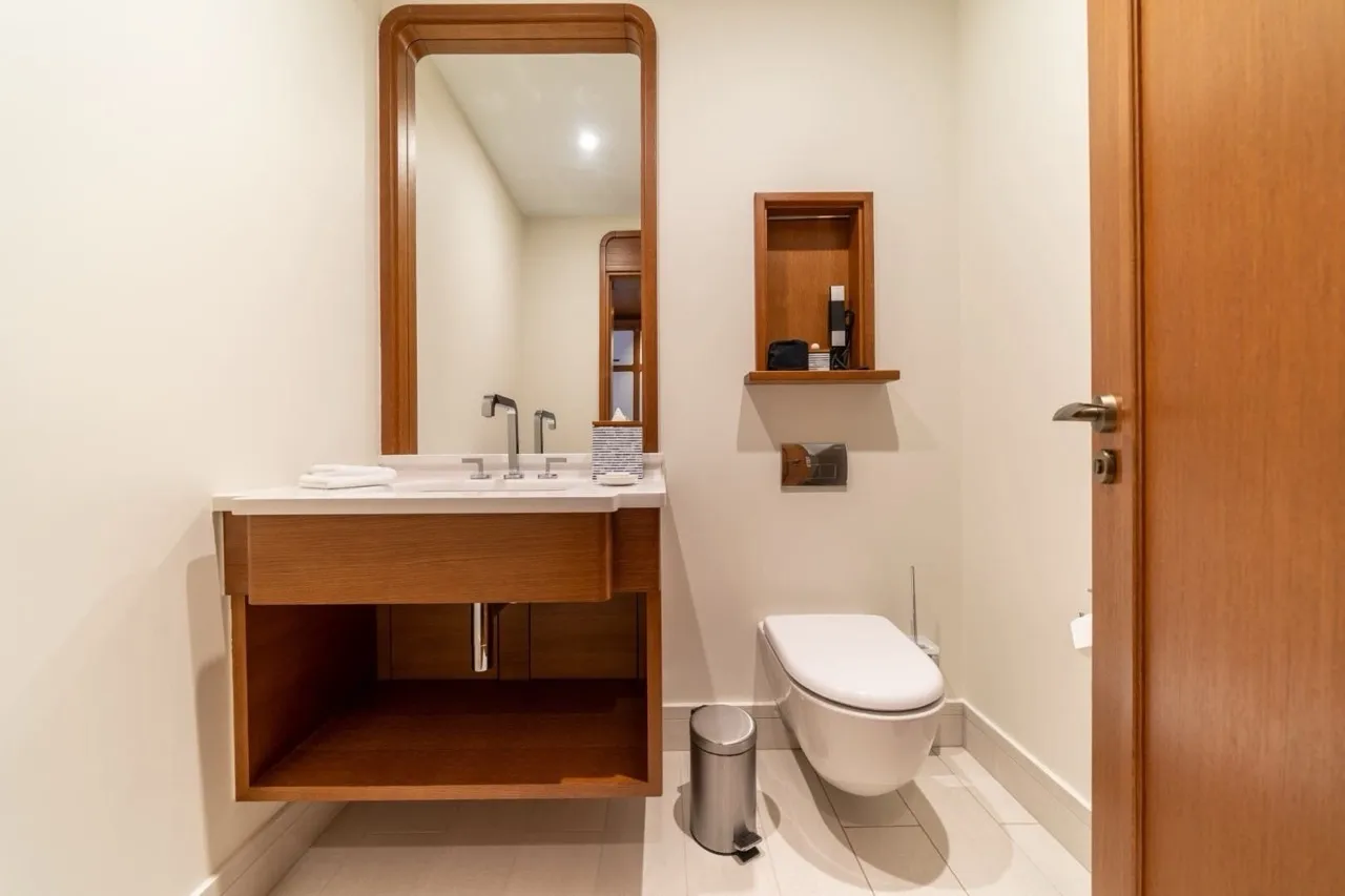 Modern bathroom with wooden furniture in an apartment in Porto Montenegro, Tivat, Montenegro.