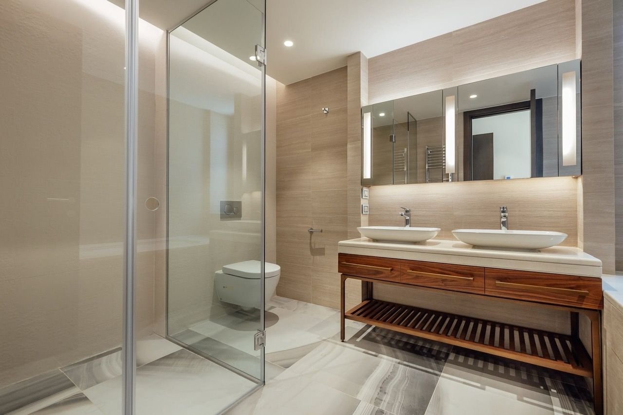 Modern bathroom with a shower cabin and double sink in a villa in Portonovi, Kumbor, Montenegro.