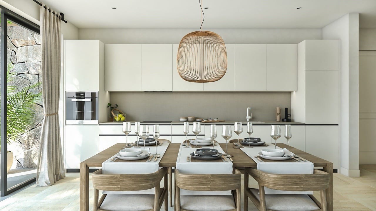 Modern kitchen-dining room in Luštica Bay apartments, Radovići, Montenegro: light-colored furniture and dining area.