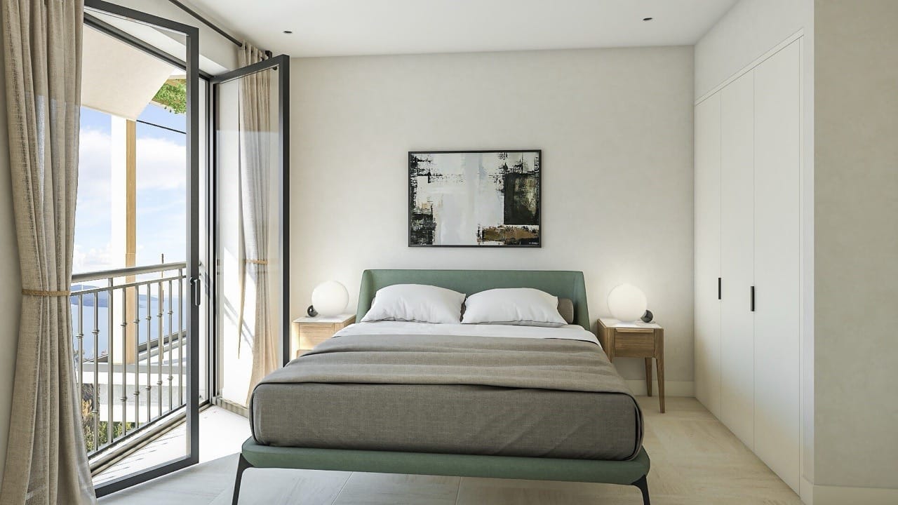 Modern bedroom in an apartment in Luštica Bay, Radovići, Montenegro: double bed, balcony with sea view.