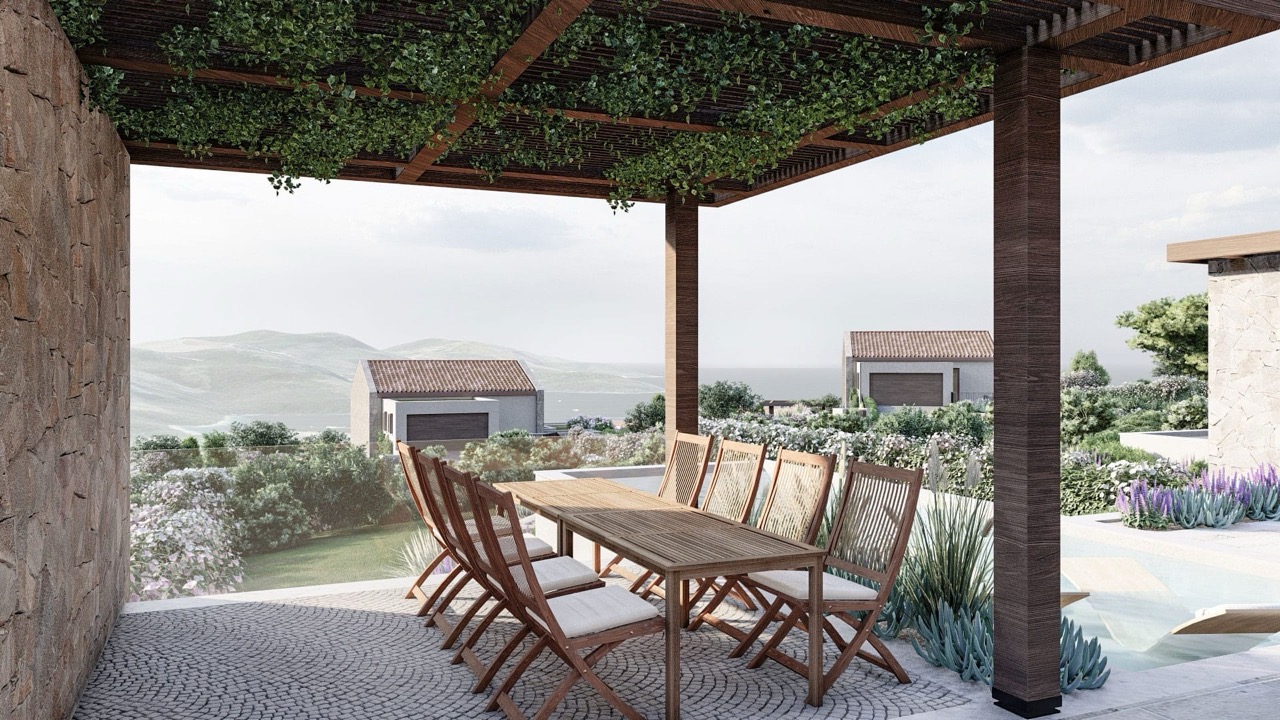 Terrasse der Villa in Luštica Bay, Radovići, Montenegro: Essbereich unter einer Pergola mit Blick auf das Meer und den Pool.
