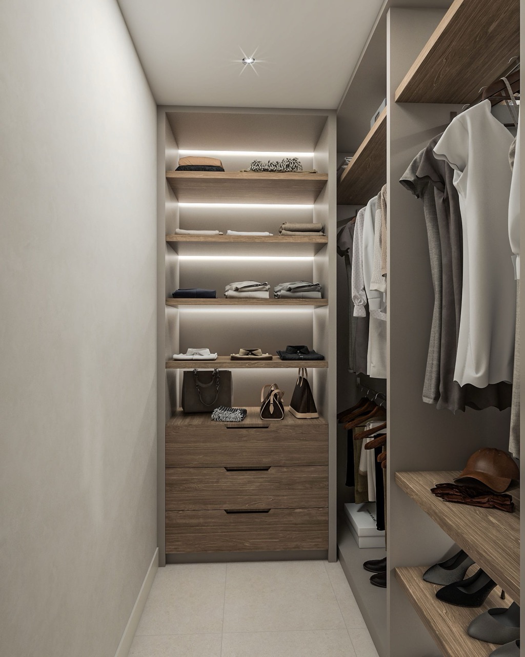 Moderne Ankleide mit beleuchteten Regalen und Holzschubladen in einer Villa in Luštica Bay, Radovići, Montenegro.