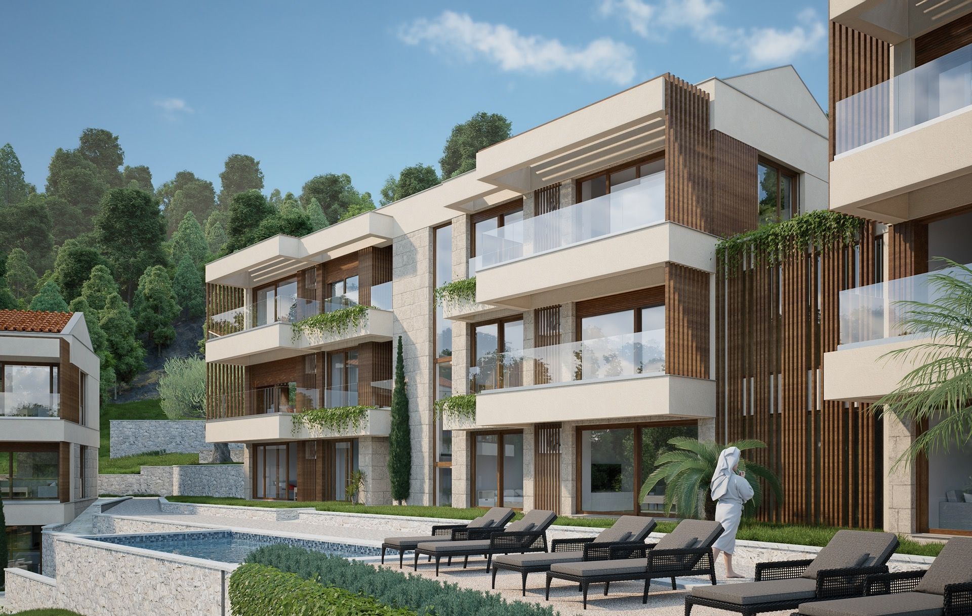 Moderner Wohnkomplex mit Pool und Terrassen in Blizikuće, Montenegro: Blick auf die Fassade und den Erholungsbereich.
