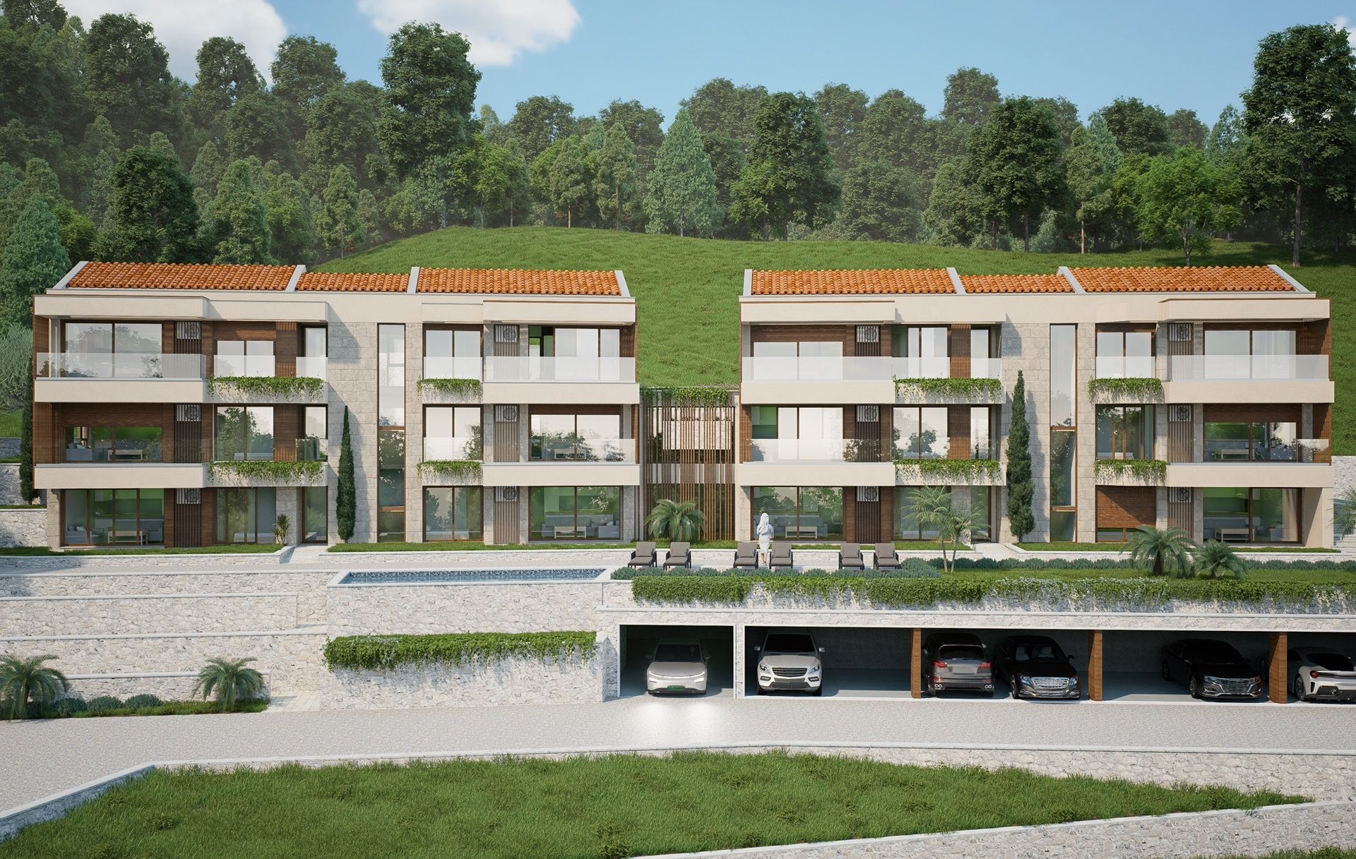 Moderner Wohnkomplex mit Pool und Parkplätzen in Blizikuće, Montenegro: Blick auf die Fassade der Gebäude mit Terrassen.