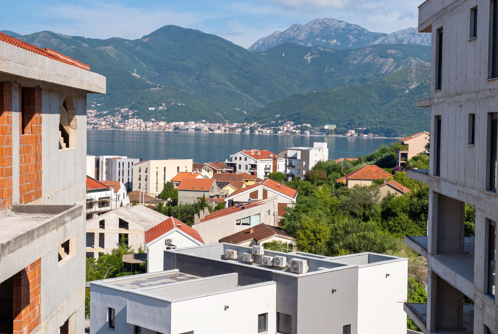 Panoramic view of the Tivat Bay and mountains from a residential complex under construction in Montenegro.