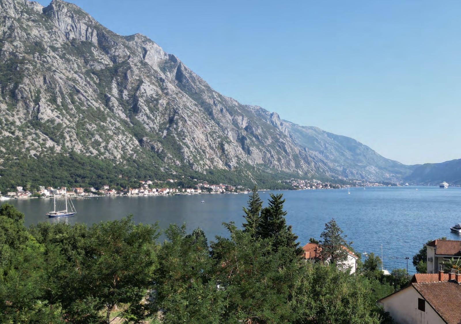 Panoramic view of the Bay of Kotor and mountains from an apartment in Orahovac, Montenegro.