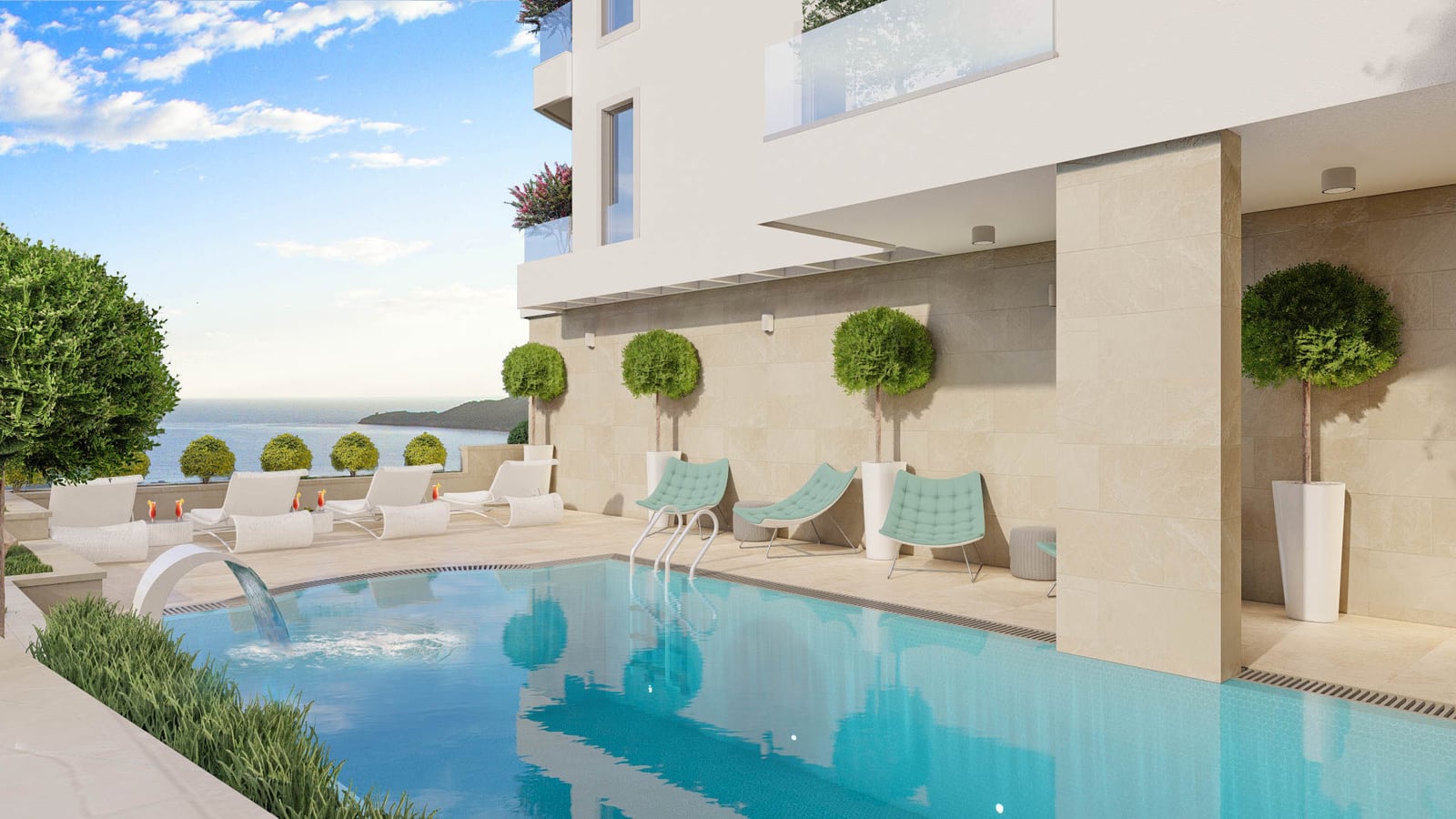 Open swimming pool with sun loungers at a modern residential complex in Becici, Montenegro