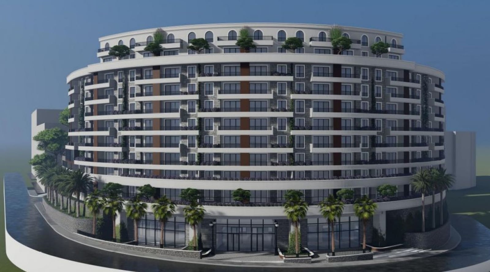 Karadağ, Bečići’de teraslı ve panoramik camlı modern konut kompleksi — binanın cephe görünümü.