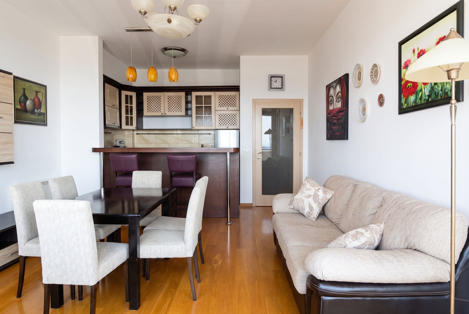 Living room with dining area and kitchen in an apartment in Bečići, Montenegro