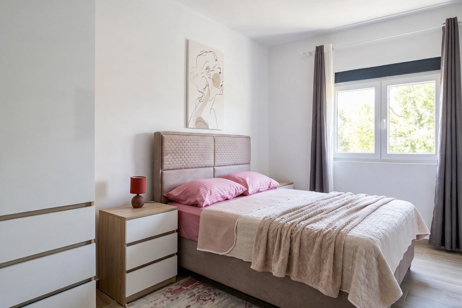 Bright bedroom with a double bed and nightstands in an apartment in Bečići, Montenegro