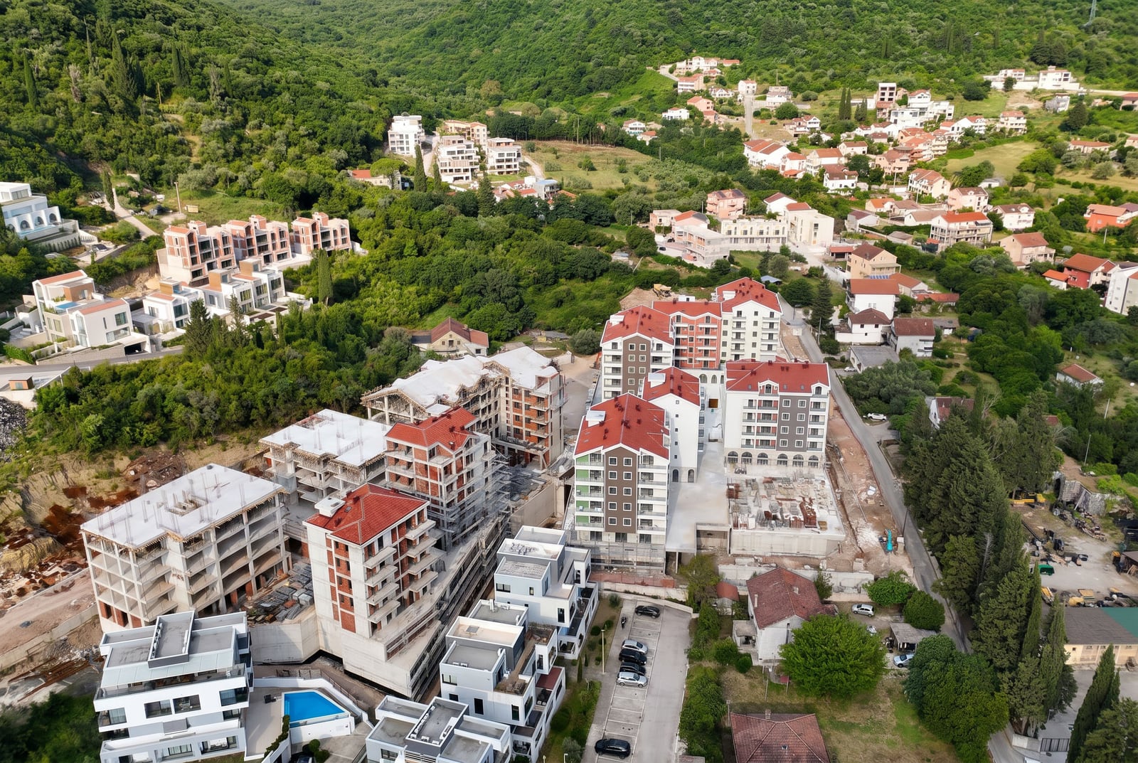 Aerial photography of new buildings and residential complex under construction in Tivat, Montenegro