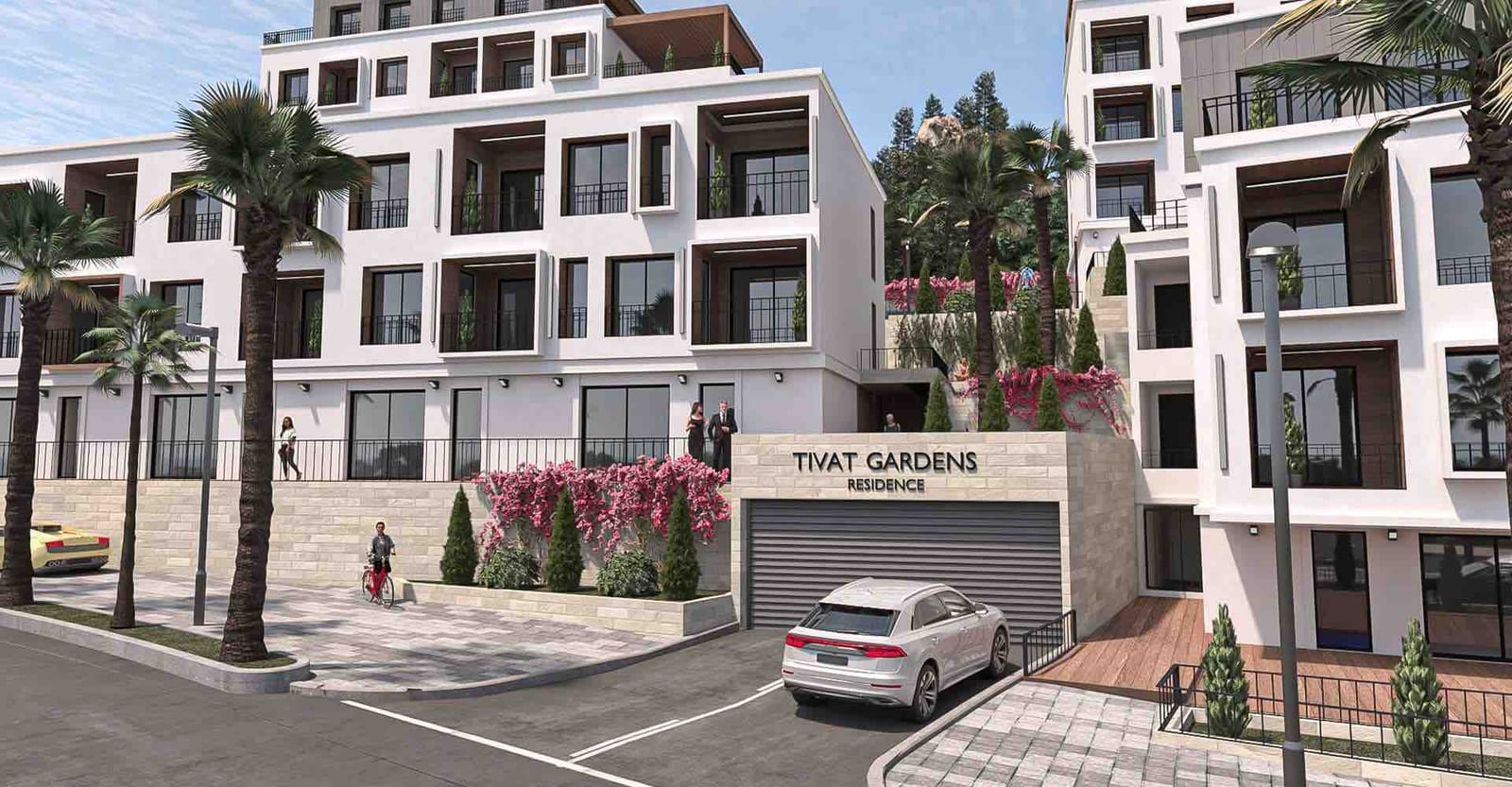 Modernes Wohnkomplex Tivat Gardens in Tivat, Montenegro: Fassade des Gebäudes mit Terrassen, Palmen und Parkplatz.