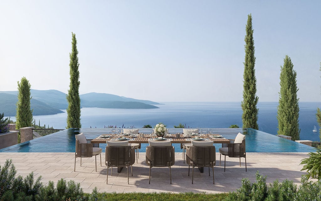 Terrasse mit Essbereich und Panoramapool mit Meerblick in Luštica, Montenegro.