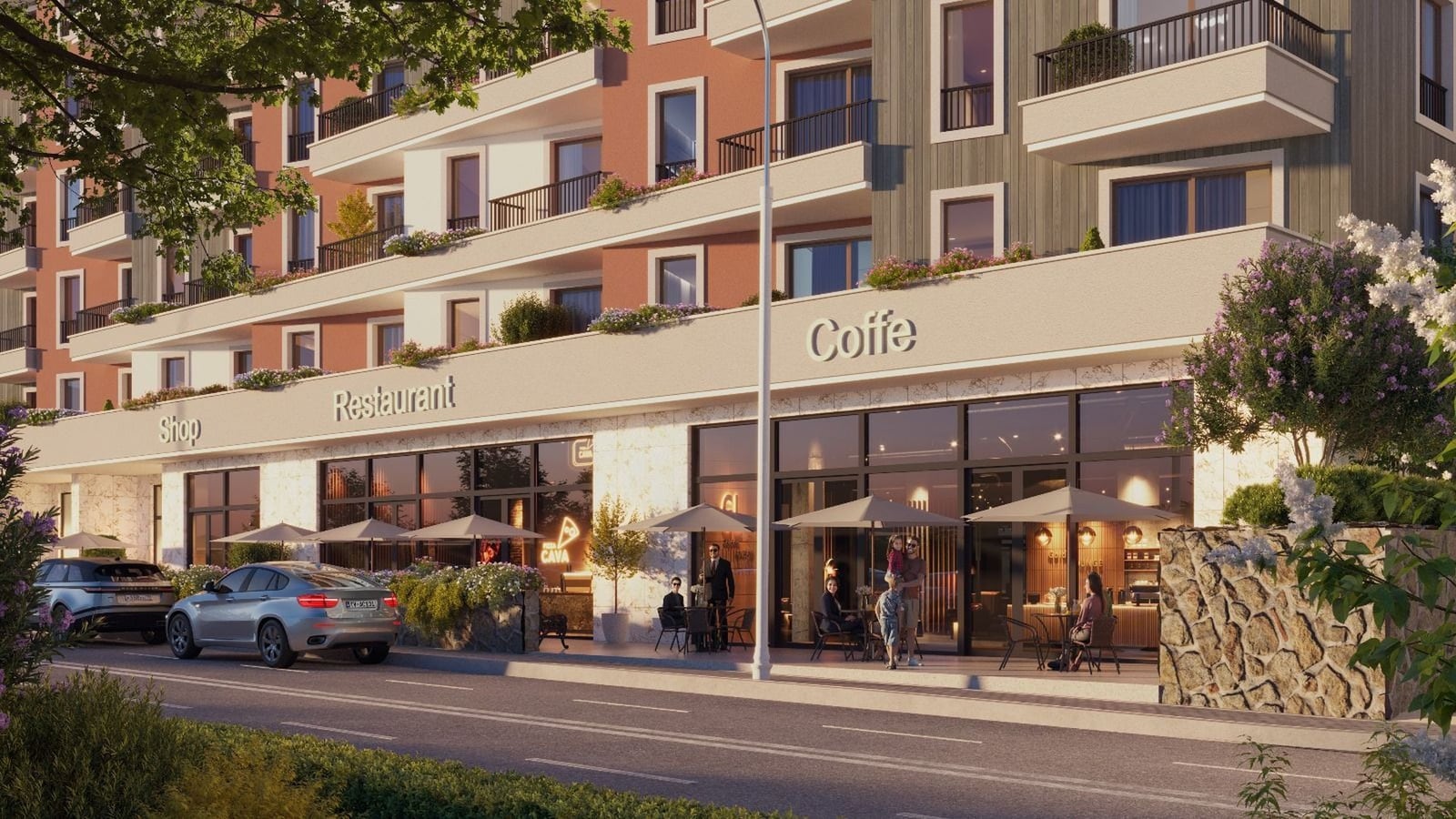 Karadağ, Bečići’de modern bir konut kompleksi: binanın zemin katında ticari alanlar, restoran ve kafe.