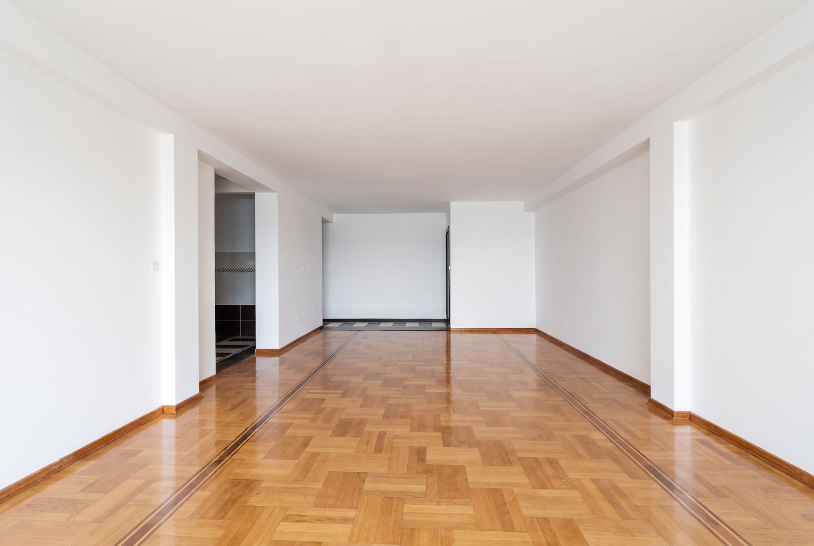 Spacious bright living room with parquet flooring in an apartment in Petrovac, Montenegro