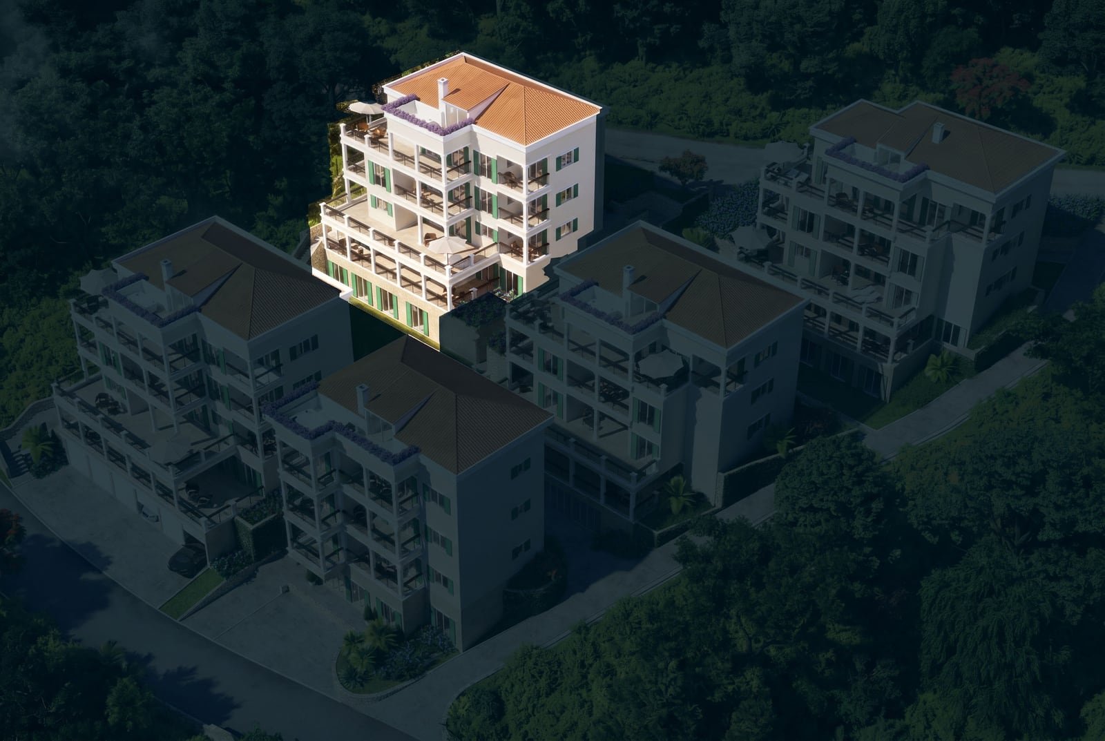 Vue aérienne d'un complexe résidentiel à Kumbor, Monténégro : maisons modernes avec terrasses et toits en tuiles entourées par la forêt.