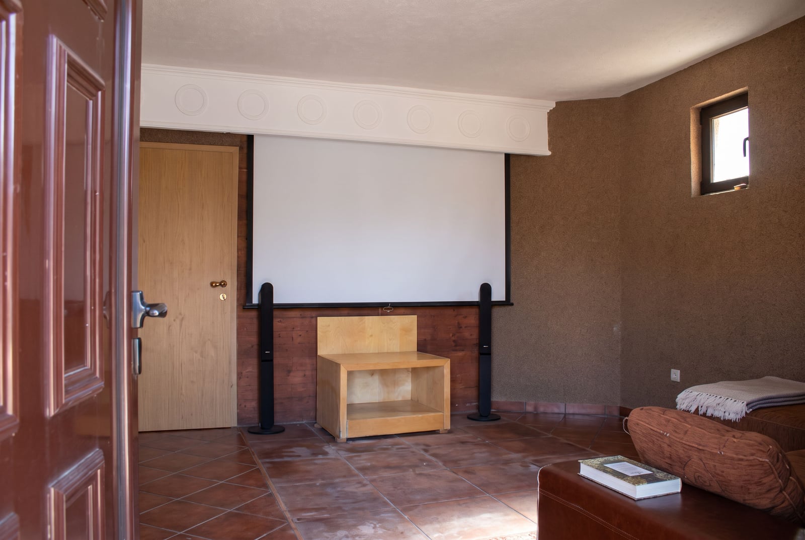 Home theater with a projection screen and audio system in a house in Tivat, Montenegro