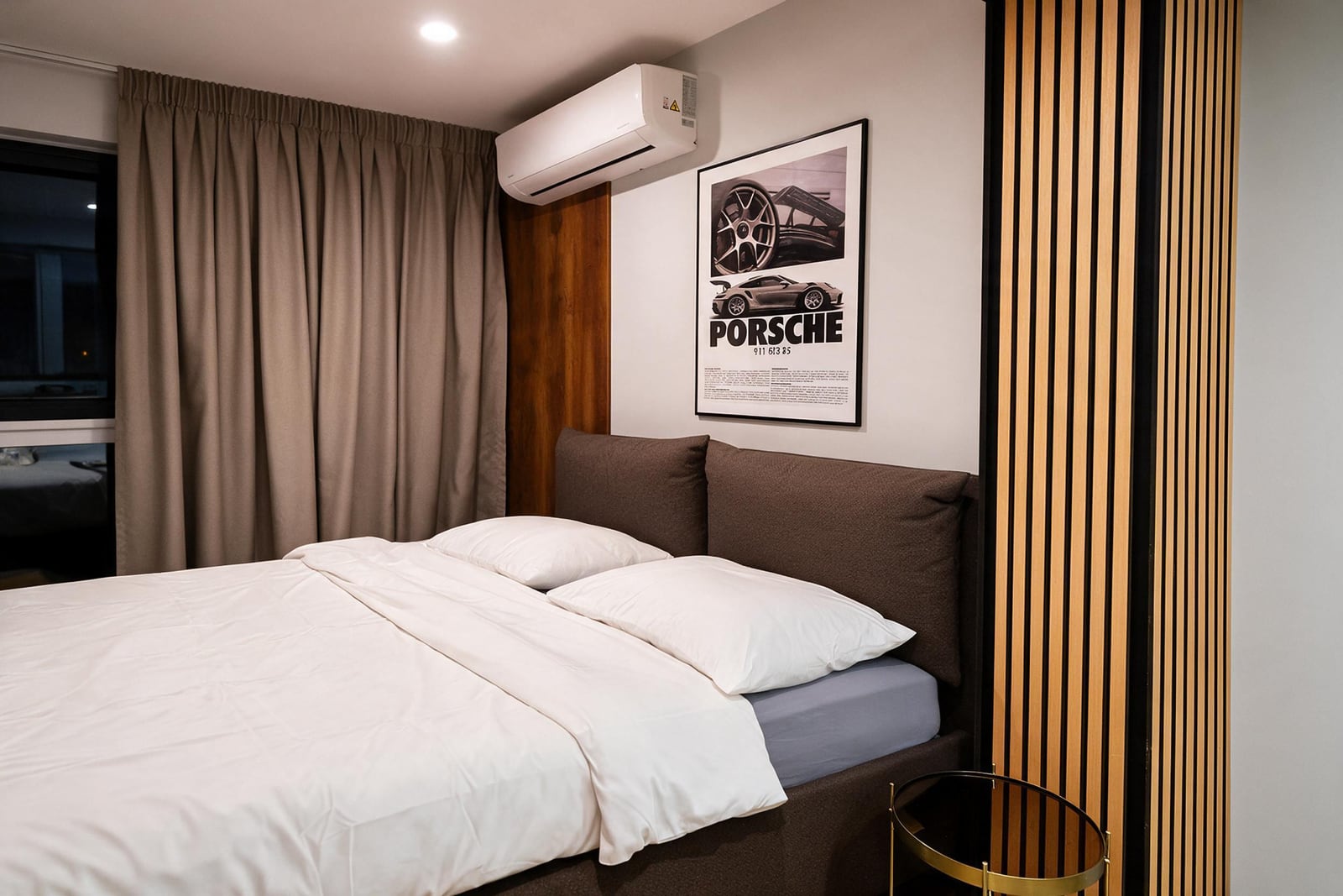 Modern bedroom with a double bed and decor in an apartment in Budva, Montenegro