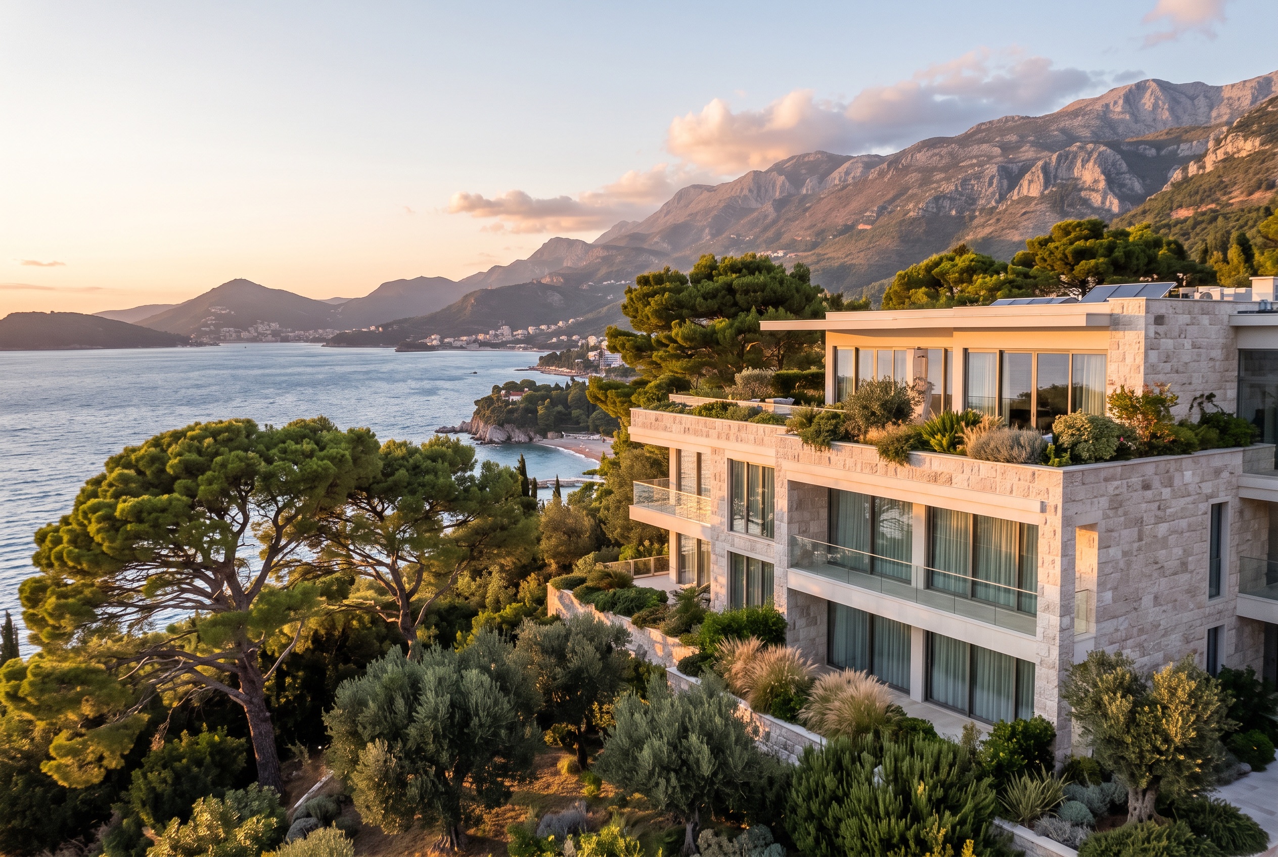 Modern residential building with glass balconies overlooking the sea on the Budva Riviera